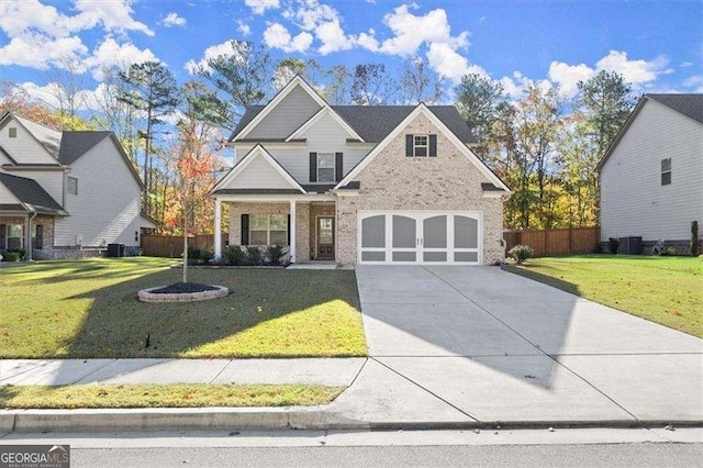 1511 Arica Ave, Lawrenceville, GA 30043 - view of front of home featuring concrete driveway, brick siding, an attached garage, and covered porch