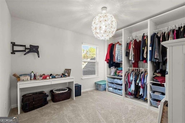 1511 Arica Ave, Lawrenceville, GA 30043 - spacious closet featuring a chandelier and carpet