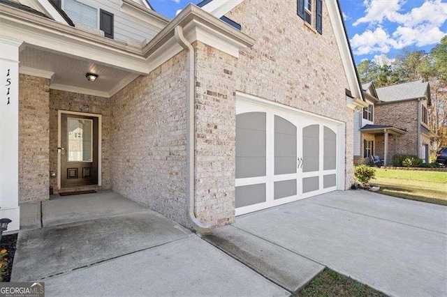 1511 Arica Ave, Lawrenceville, GA 30043 - entrance to property featuring concrete driveway and an attached garage