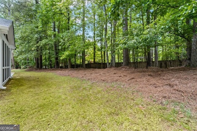 view of yard featuring fence