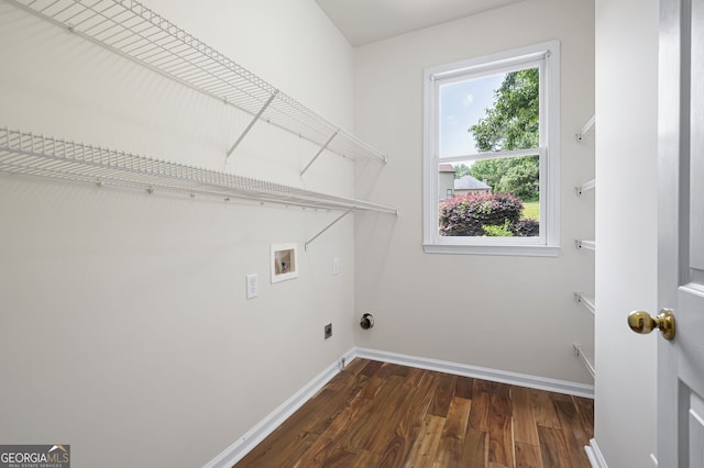 5034 Kingsbridge Pass, Powder Springs, GA 30127 - laundry area with wood finished floors, washer hookup, and baseboards