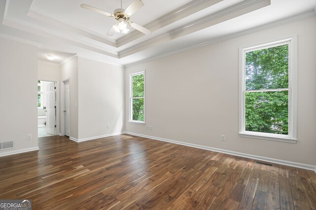 5034 Kingsbridge Pass, Powder Springs, GA 30127 - unfurnished room featuring a tray ceiling, ceiling fan, hardwood / wood-style flooring, ornamental molding, and baseboards