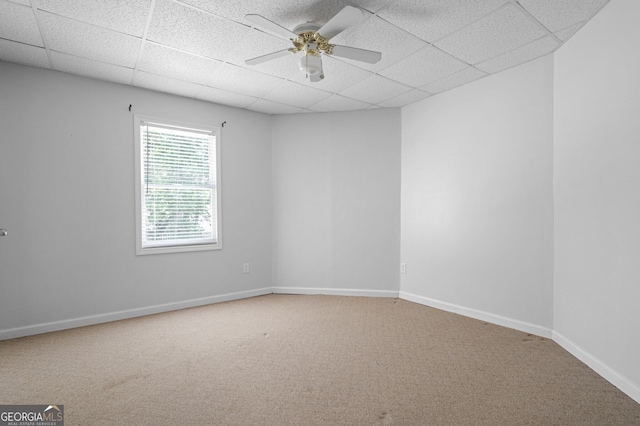 5034 Kingsbridge Pass, Powder Springs, GA 30127 - carpeted spare room featuring a drop ceiling, baseboards, and ceiling fan