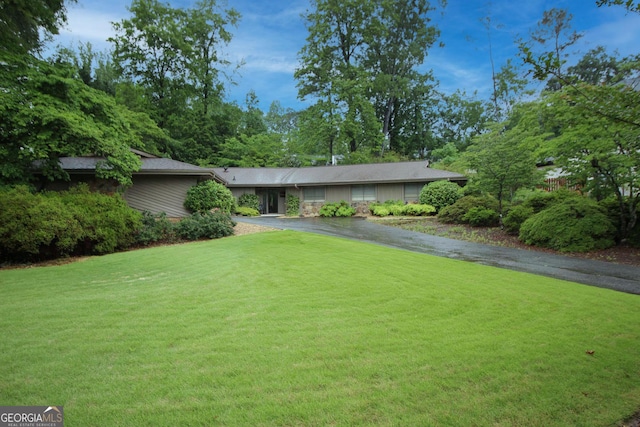 3353 Greenfield Dr, Marietta, GA 30068 - view of front of home with asphalt driveway and a front lawn