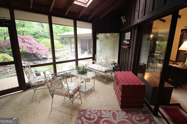 3353 Greenfield Dr, Marietta, GA 30068 - sunroom featuring a skylight, beam ceiling, and wooden ceiling