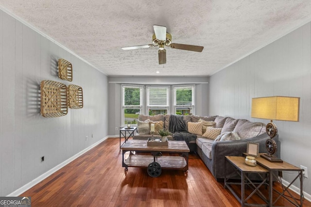 3441 Sherrod Dr SW, Marietta, GA 30060 - living room with hardwood / wood-style floors, ceiling fan, a textured ceiling, and crown molding
