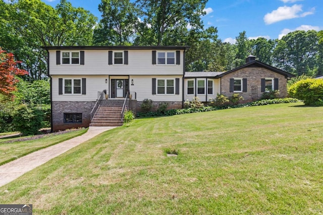 3441 Sherrod Dr SW, Marietta, GA 30060 - colonial house with brick siding and a front yard