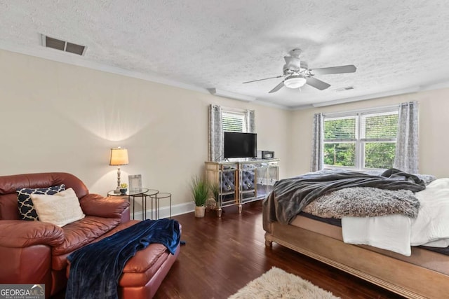 3441 Sherrod Dr SW, Marietta, GA 30060 - bedroom featuring a textured ceiling, wood finished floors, baseboards, and ceiling fan