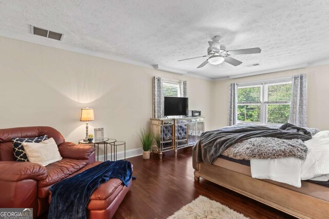 3441 Sherrod Dr SW, Marietta, GA 30060 - bedroom with a textured ceiling, wood finished floors, and a ceiling fan