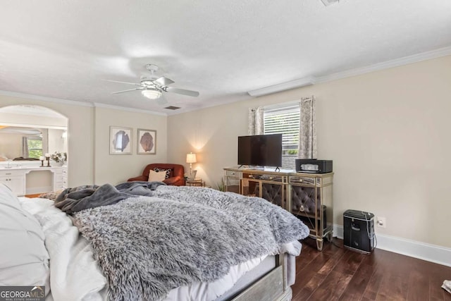 3441 Sherrod Dr SW, Marietta, GA 30060 - bedroom with arched walkways, dark wood-style flooring, baseboards, ornamental molding, and ceiling fan