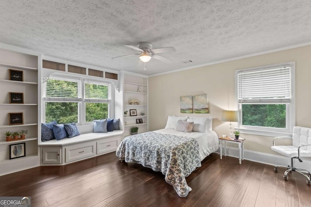 3441 Sherrod Dr SW, Marietta, GA 30060 - bedroom with dark wood-type flooring, crown molding, a textured ceiling, baseboards, and a ceiling fan