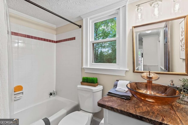 3441 Sherrod Dr SW, Marietta, GA 30060 - bathroom featuring a textured ceiling, toilet, vanity,  shower combination, and crown molding
