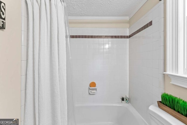 3441 Sherrod Dr SW, Marietta, GA 30060 - bathroom with toilet, shower / bath combo, a textured ceiling, and ornamental molding