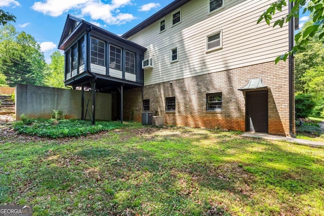 3441 Sherrod Dr SW, Marietta, GA 30060 - back of property with brick siding and a sunroom