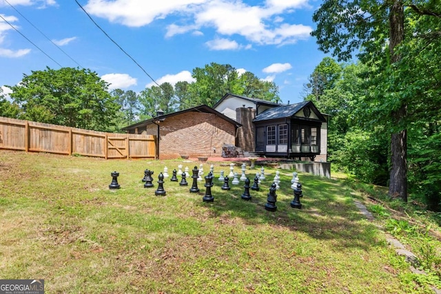 3441 Sherrod Dr SW, Marietta, GA 30060 - view of yard featuring a sunroom