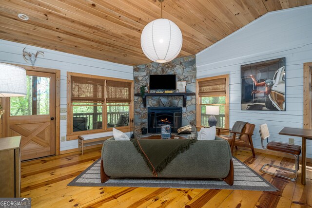 7 Ascherman Ct, Blue Ridge, GA 30513 - living area featuring lofted ceiling, wood ceiling, healthy amount of natural light, hardwood / wood-style floors, and wooden walls