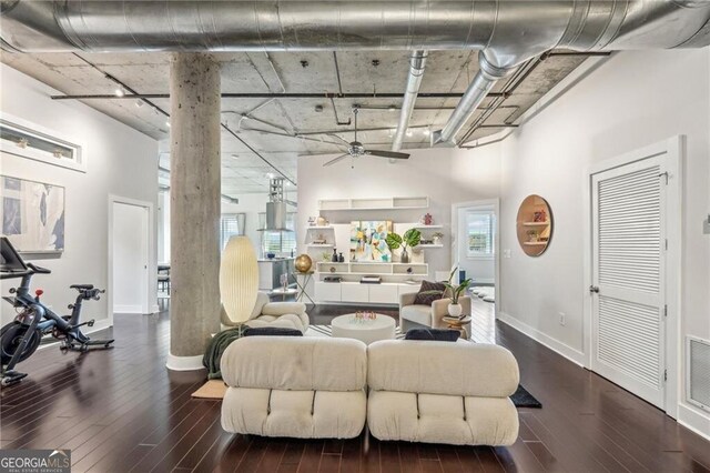 206 NE 11th St NE Unit Ph703, Atlanta, GA 30309 - living room featuring ceiling fan, wood-type flooring, baseboards, and a high ceiling