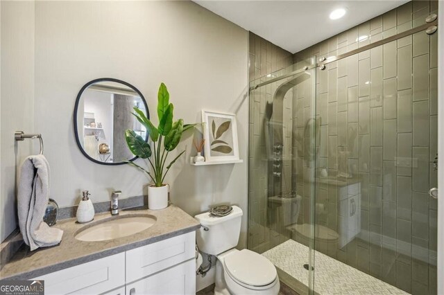 206 NE 11th St NE Unit Ph703, Atlanta, GA 30309 - full bath with a stall shower, vanity, toilet, and recessed lighting