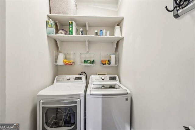 206 NE 11th St NE Unit Ph703, Atlanta, GA 30309 - laundry area featuring washer and dryer