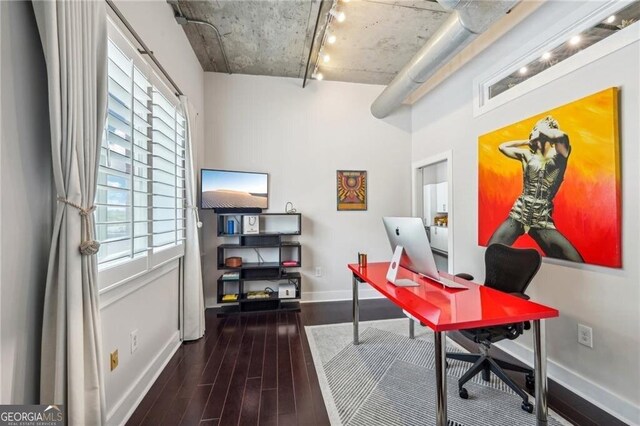 206 NE 11th St NE Unit Ph703, Atlanta, GA 30309 - office space featuring wood finished floors, baseboards, plenty of natural light, and track lighting