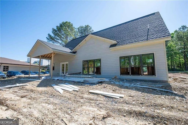 140 Cambridge Ct, Calhoun, GA 30701 - rear view of house featuring french doors and a shingled roof