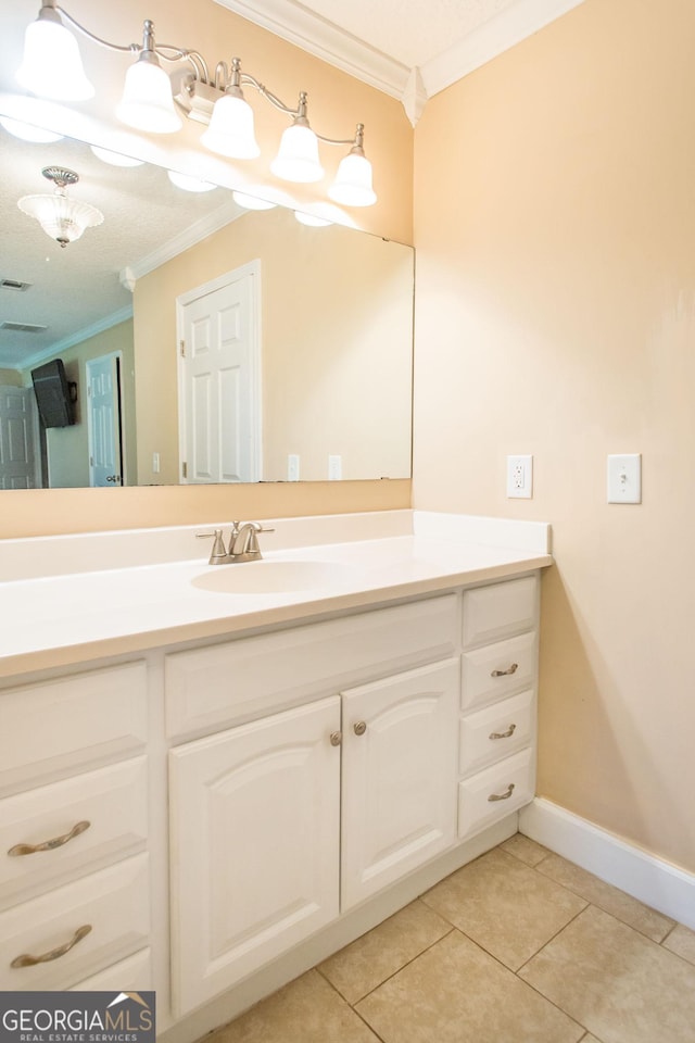 3842 Kay Cir, Blackshear, GA 31516 - bathroom featuring crown molding, tile patterned flooring, vanity, and baseboards