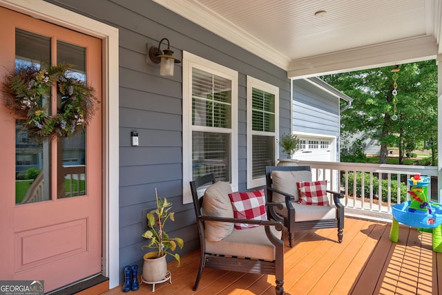 deck featuring covered porch