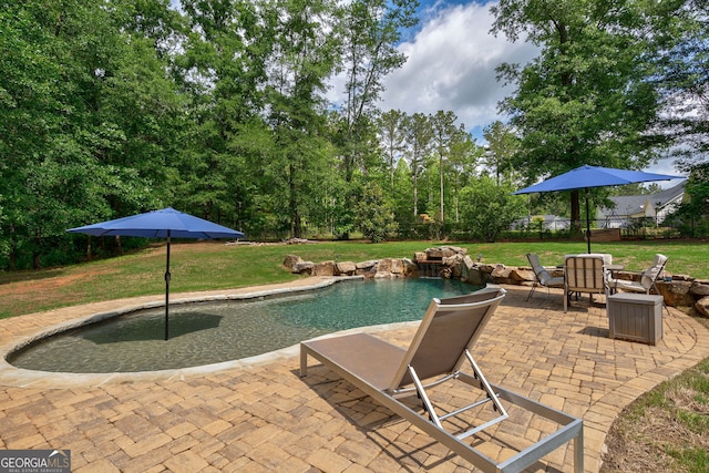 swimming pool with a patio