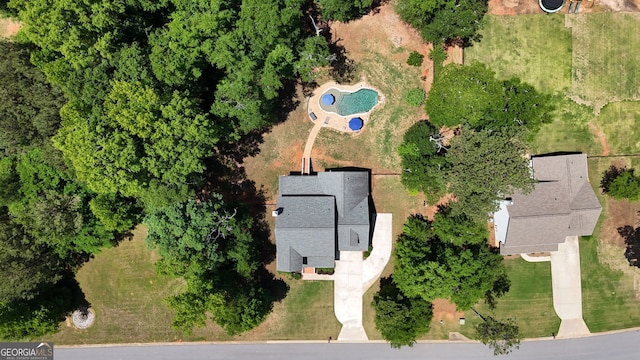 view of property location with a pool