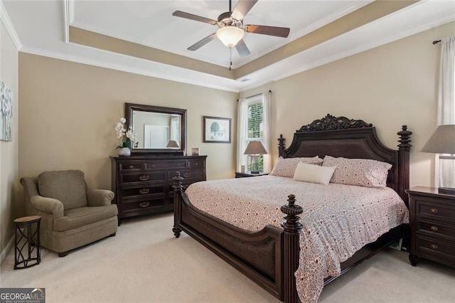 3365 Buffington Ln, Cumming, GA 30040 - bedroom with light carpet, a tray ceiling, crown molding, and a ceiling fan