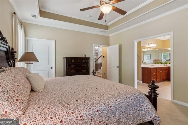 3365 Buffington Ln, Cumming, GA 30040 - bedroom featuring a tray ceiling, crown molding, light carpet, ensuite bath, and ceiling fan