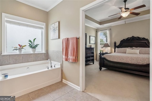 3365 Buffington Ln, Cumming, GA 30040 - ensuite bathroom with ornamental molding, a garden tub, baseboards, a ceiling fan, and tile patterned flooring