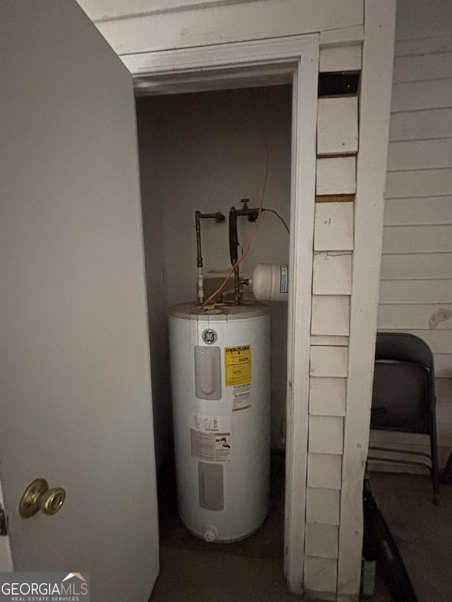 3709 Charlotte Dr, Rex, GA 30273 - utility room with electric water heater