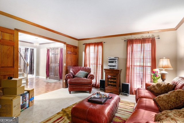 carpeted living area with crown molding and baseboards