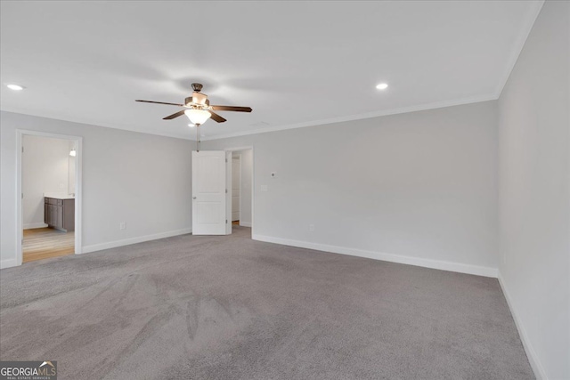 unfurnished room with baseboards, a ceiling fan, carpet flooring, crown molding, and recessed lighting