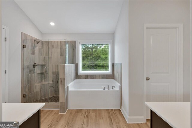 116 Daffodil Lndg, Dallas, GA 30132 - bathroom featuring vanity, a garden tub, and a shower stall