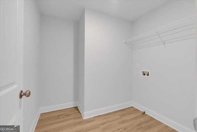 116 Daffodil Lndg, Dallas, GA 30132 - clothes washing area featuring washer hookup, light wood-style flooring, and baseboards