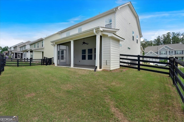 back of property featuring a ceiling fan and a patio