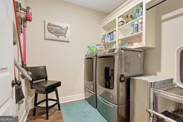 233 Isabella Way, Jesup, GA 31546 - laundry area featuring washing machine and dryer, wood finished floors, and baseboards