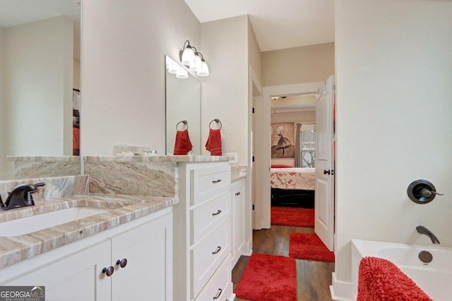 233 Isabella Way, Jesup, GA 31546 - bathroom with wood finished floors, ensuite bathroom, and vanity
