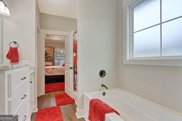233 Isabella Way, Jesup, GA 31546 - bathroom with wood finished floors and connected bathroom