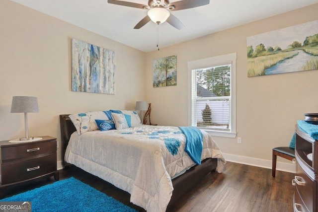 233 Isabella Way, Jesup, GA 31546 - bedroom with dark wood-style floors, baseboards, and ceiling fan