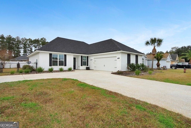 233 Isabella Way, Jesup, GA 31546 - view of front facade with an attached garage and concrete driveway