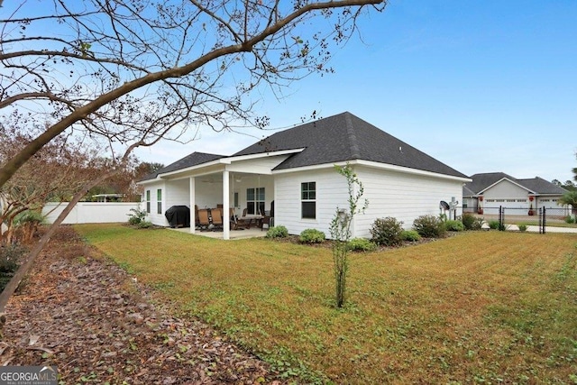 233 Isabella Way, Jesup, GA 31546 - view of side of property featuring a patio and a shingled roof