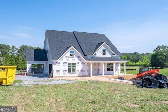 126 Telluride Trl NE, Calhoun, GA 30701 - rear view of property with a lawn and covered porch