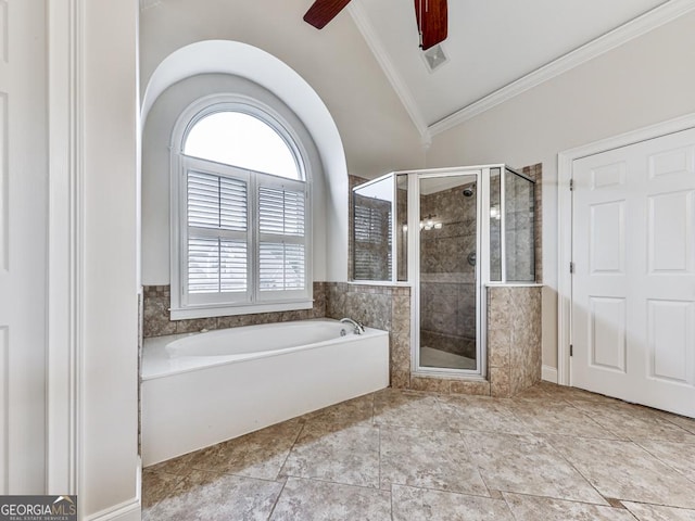 414 Candler Trl, Canton, GA 30115 - bathroom with lofted ceiling, crown molding, a bath, and a stall shower