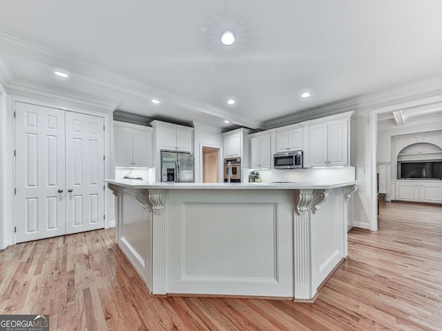 414 Candler Trl, Canton, GA 30115 - kitchen with stainless steel appliances, white cabinets, light wood finished floors, light countertops, and recessed lighting