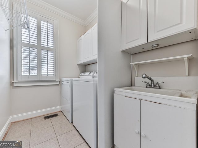 414 Candler Trl, Canton, GA 30115 - washroom with washing machine and dryer, cabinet space, ornamental molding, and light tile patterned flooring
