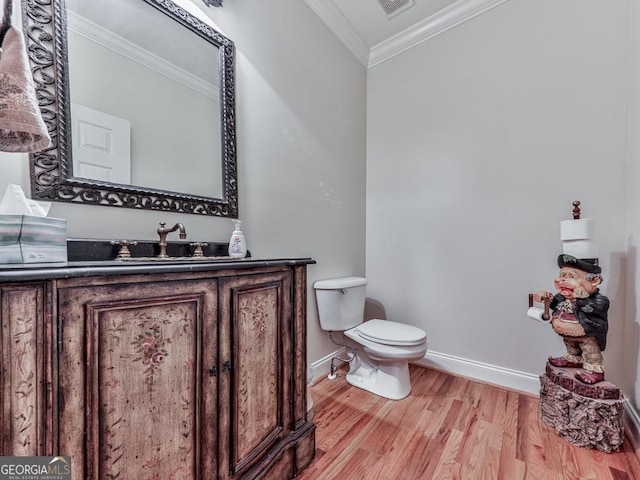 414 Candler Trl, Canton, GA 30115 - half bathroom with ornamental molding, wood finished floors, and vanity