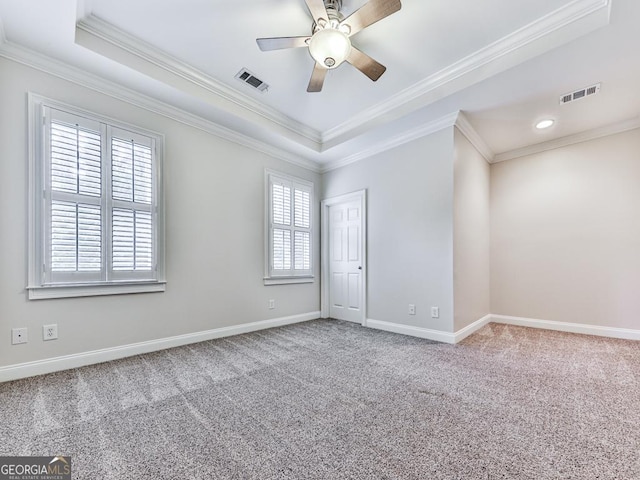 414 Candler Trl, Canton, GA 30115 - empty room featuring crown molding, carpet flooring, a ceiling fan, and a raised ceiling